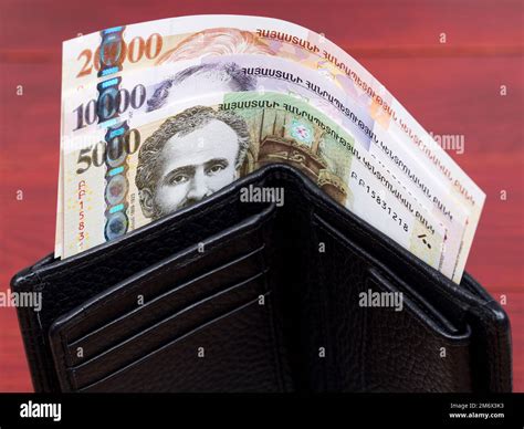 Old Armenian money - dram in the black wallet Stock Photo - Alamy