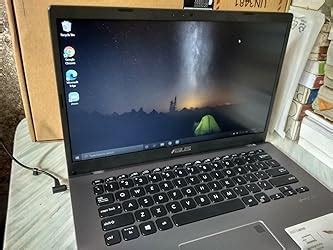 ASUS VivoBook 14 AMD Ryzen 3 3250U 35.56 cm (14-inch) FHD Compact and ...