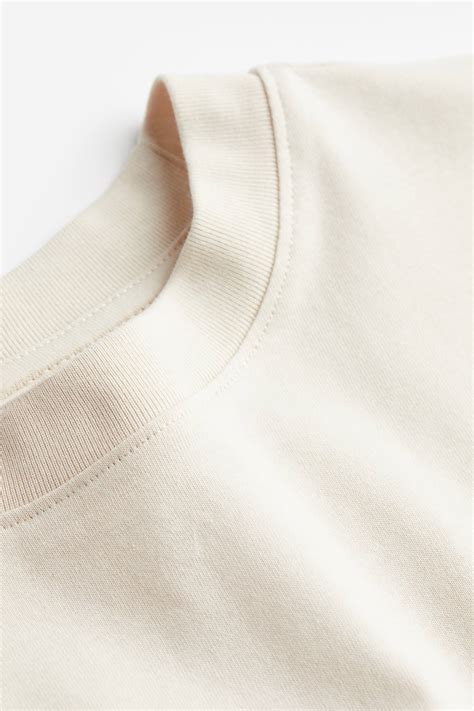 Oversized T-shirt dress - Light beige - Ladies | H&M IN