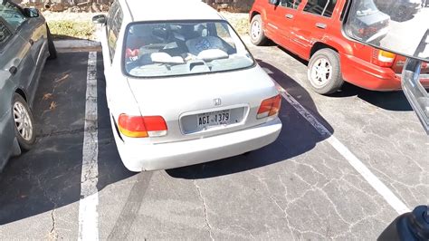 She Pulled The Sticker Off Hoping To Stop The Tow