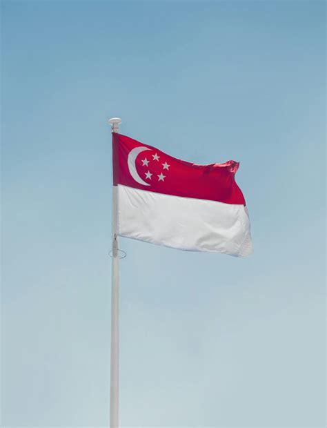 A red and white flag photo - Free Red Image on Unsplash