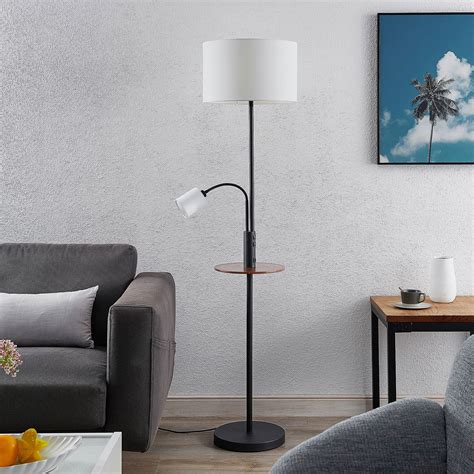 Lindby Aovan floor lamp, black, shelf, USB port | Lights.ie