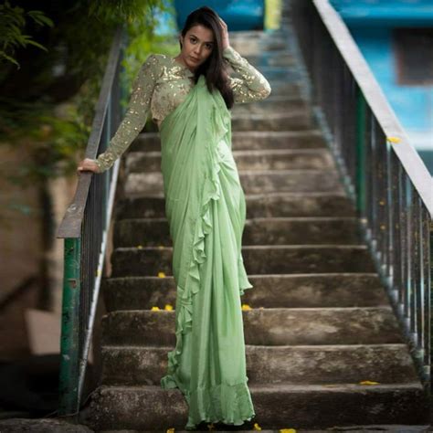 Flattering Pista Green Colored Partywear Embroidered Rangoli Silk Saree