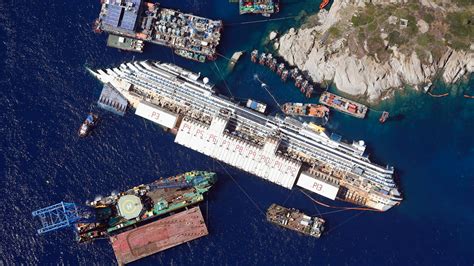 Haunting photos show wreck of infamous £400m Costa Concordia cruise ...