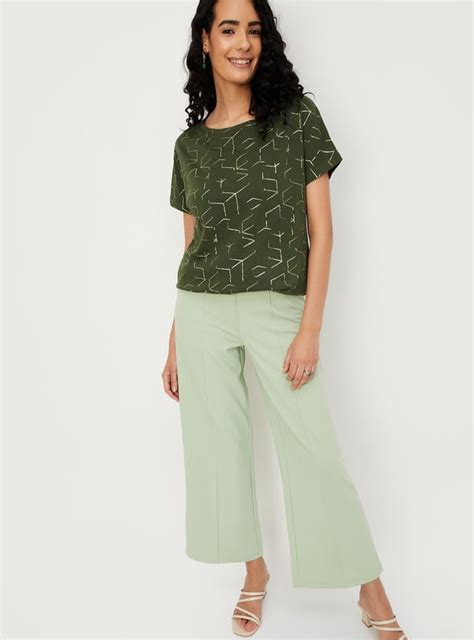 Buy Women Glitter Printed T-shirt Online at just Rs. 399.0 ...