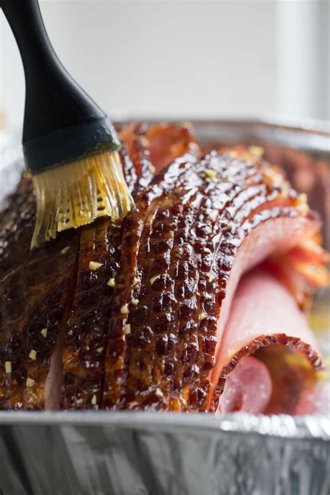 How To Slow Cook a Precooked Ham In The Oven - Lauren's Latest