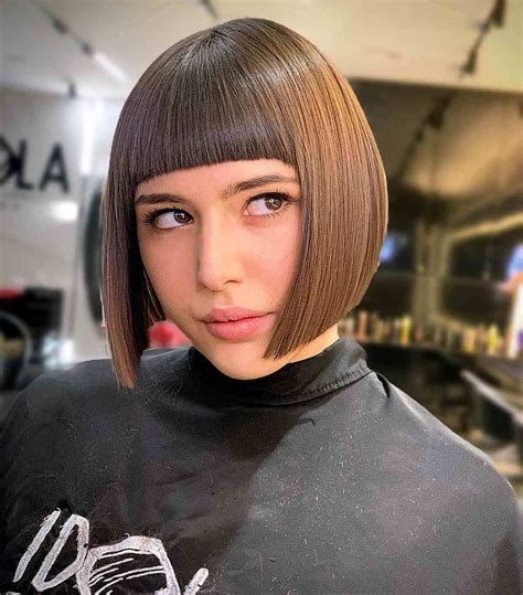 The Top 50 Hairstyles for Oval Faces of 2026 | Bob haircut with bangs ...