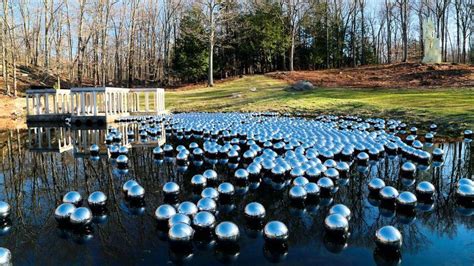 Art | Yayoi Kusama's pumpkin installation channels a distinctive yellow ...