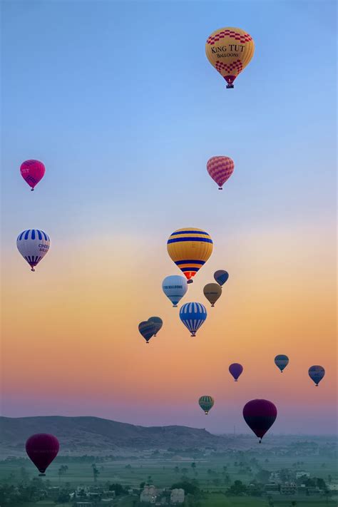 Download wallpaper 800x1200 hot air balloons, flight, sky, sunrise ...
