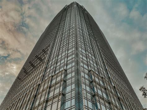 Download wallpaper 1400x1050 building, bottom view, facade, glass ...