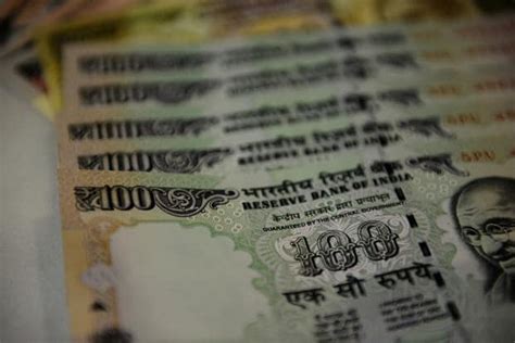 Indian bonds gain on hopes of dovish policy; rupee gains aid