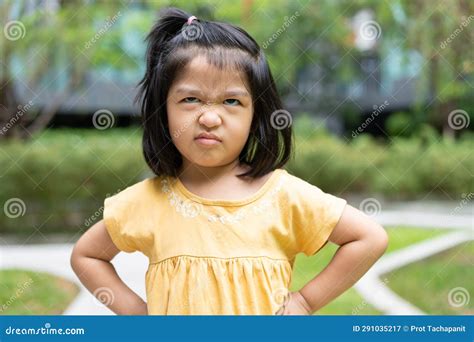 Portrait of an Asian Angry and Sad Little Girl. the Emotion of a Child ...