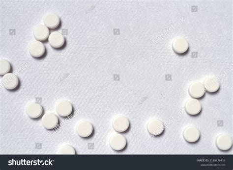 Small White Pills On White Medical Stock Photo 2188435455 | Shutterstock