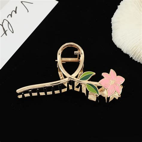 Simreen 1 pcs of Golden Metal hair claw flower hair claw clutcher hair ...