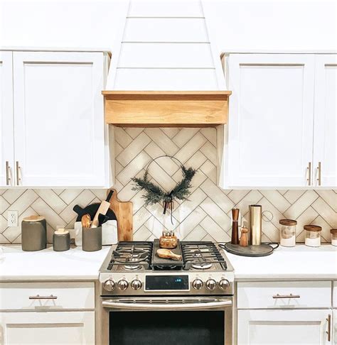 14 Modern Designs for a White Range Hood With Wood Trim