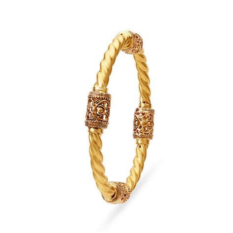 Magnificent 22 Karat Yellow Gold Carved Spiral Bangle