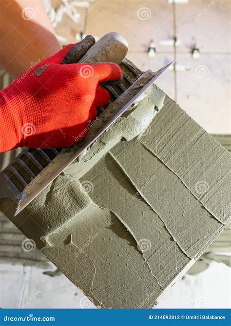 Applying Thinset Mortar on a Tile. Apply the Adhesive, Closeup Stock ...