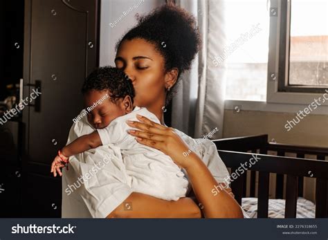 Woman Holding A Baby