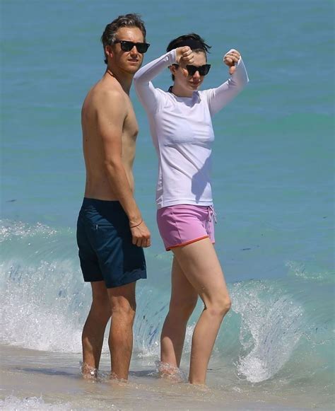 Anne Hathaway in a Covered Bikini, Beach in Miami - March 2014 • CelebMafia