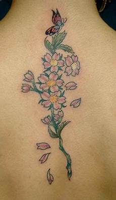 tatuaggio ramo con fiori foto tatuaggio ramo di ciliegio con farfallina the house tatuaggio ramo con fiori foto tatuaggio ramo di ciliegio con farfallina the house