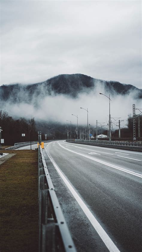 Download wallpaper 938x1668 road, mountains, clouds, landscape iphone 8 ...