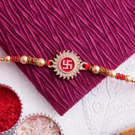 Send Designer Swastika Rakhi Online