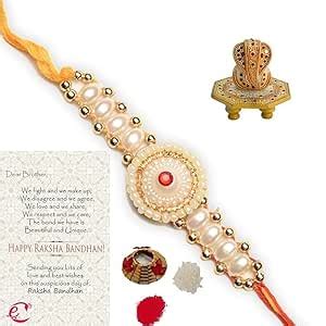 eCraftIndia Designer Rakhi with Ridhi Sidhi Marble chowki and Roli ...