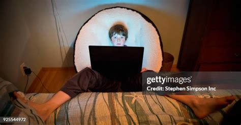 Barefoot Child Using Computer 的图像结果