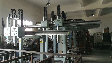 机床桁架机械手的优点_上海工业非标自动化机械手生产厂家