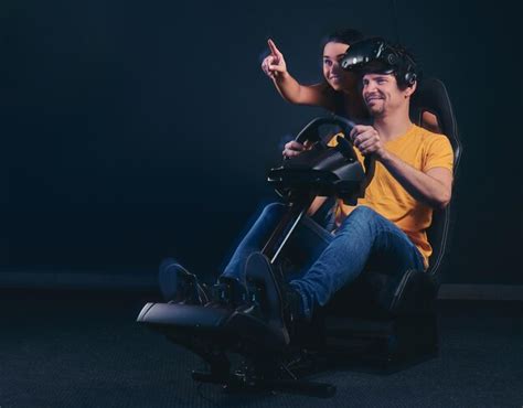 Image result for Man Driving a Racing Simulator