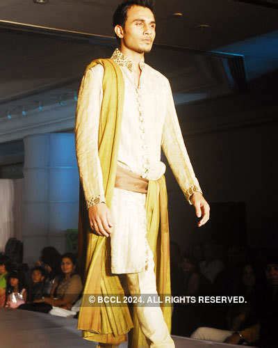 Models walk the ramp to unveil designers Neeta Lulla, Nisshka Lulla ...
