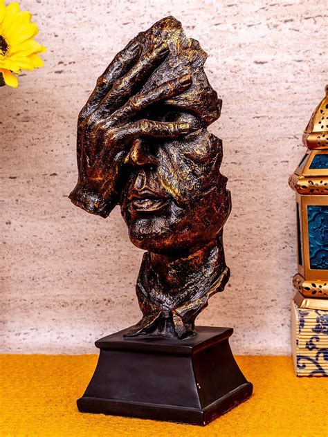 Buy | Gold-Toned & Brown Decorative Human Face | Tied Ribbons