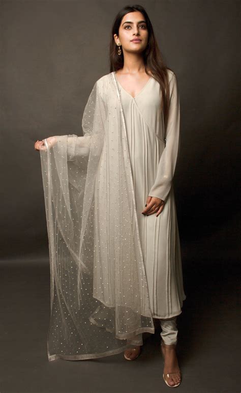This angrakha in steel grey is highlighted with vertical pin-tucks all ...