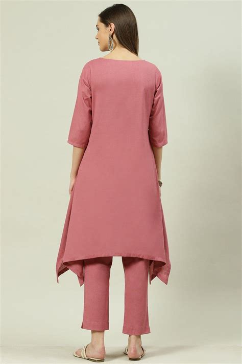 Dusky Peach Solid Asymmetric Kurta Slim Pant Suit Set