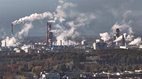 aerial view on smoked pipes of chemical enterprise plant. Air pollution ...