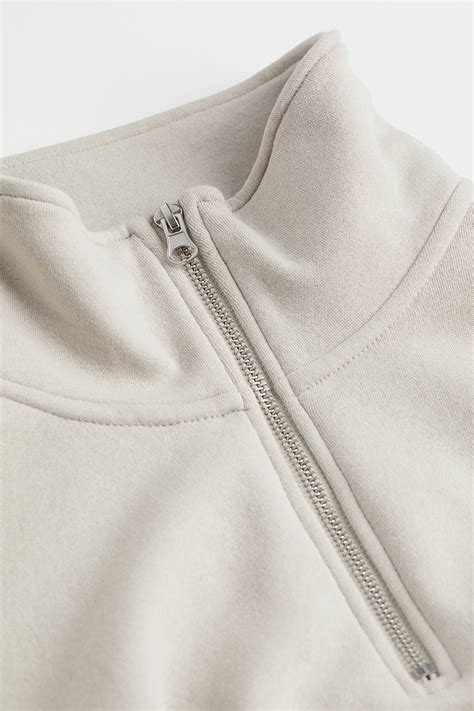 Zip-top sweatshirt - Light beige - Ladies | H&M IN