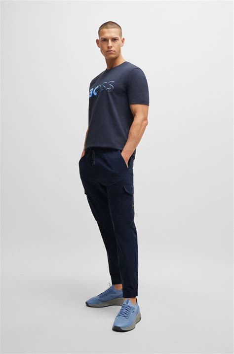 BOSS - Tapered-fit trousers in easy-iron stretch poplin - Dark Blue