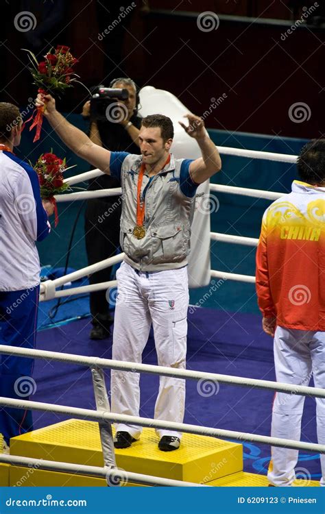 Olympic Boxer Wins Gold editorial stock photo. Image of defeats - 6209123