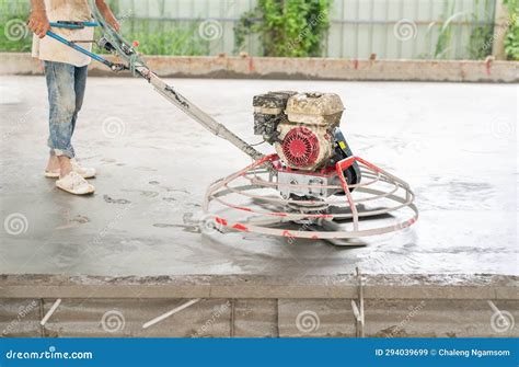 Worker Use Scrub Floor Machine To Polish Surface New Concrete Floor ...