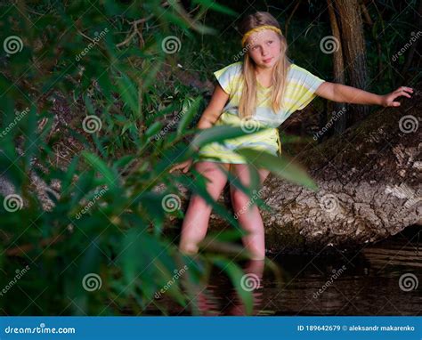 Blonde Girls with Blue Eyes on the Lake at Sunset Stock Image - Image ...
