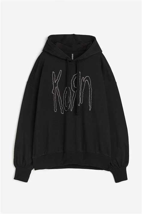 Oversized print-motif hoodie - Black/Korn - Ladies | H&M IN