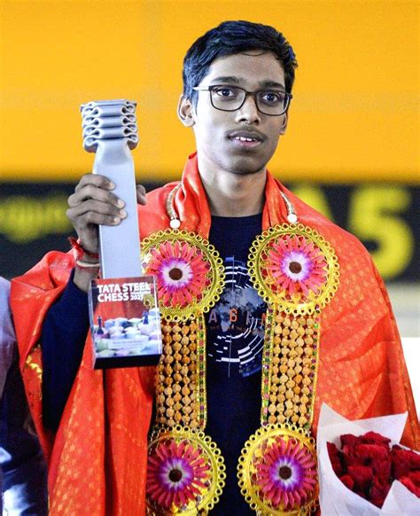 Grandmaster R. Praggnanandhaa arrives at the airport