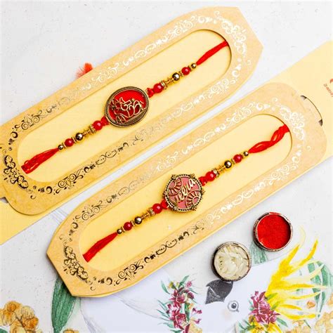 Send Set of 2 Designer Ganesha & Veera Rakhis Online - RKH22-107564 ...