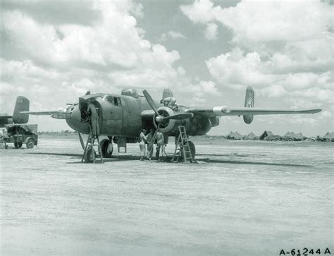 Asisbiz B 25 Mitchell 5AF 345BG 014 being rearmed Luzon Philippines Aug ...