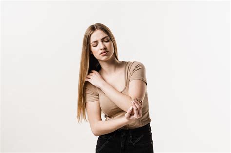 Premium Photo | Elbow injury of girl on white background traumatology ...