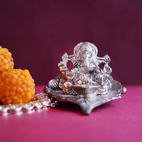 Send Silver Ganesha Idol with Moti Bundi Laddoo Online - GAL21-99333 ...