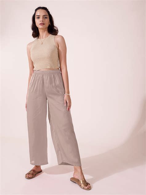 Women Solid Copper Mid Rise Shiny Palazzos