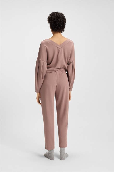 BOSS - Tapered-fit tracksuit bottoms with gloss piping - Light Brown