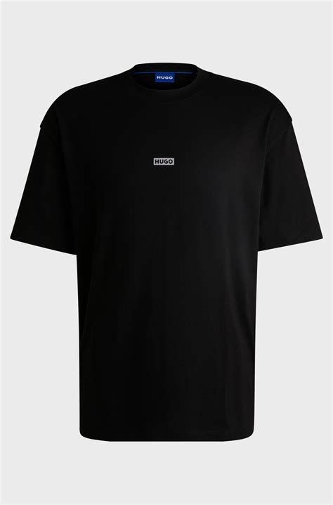 HUGO - Loose-fit T-shirt in cotton with rear logo artwork - Black
