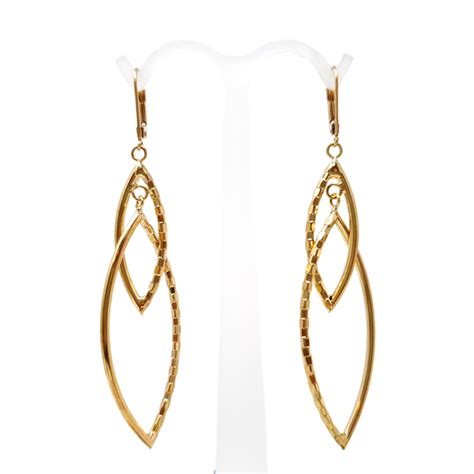 Aretes largos en Oro de 14K con diseño liso y facetado - Joyería Ruben ...